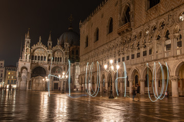 Writing with Light in front of the Illuminated Doge Palace on the Marks Square at Night, Venice/Italy