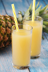 Two glasses with pineapple juice	