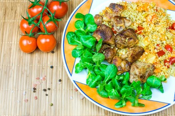 Barley porridge with meat and vegetables  . pearl-barley porridge