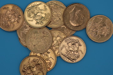 gold coins on blue background