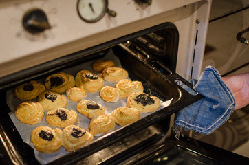 baking cookies in the oven. Close up. Selective focus.