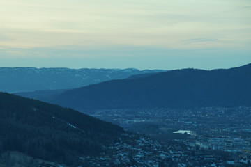 A city in valley between mountains.