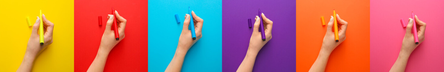 Female hands with felt-tip pens on colorful background