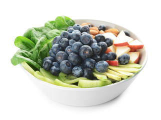 Bowl with tasty salad on white background