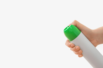 Female hand with air freshener on white background
