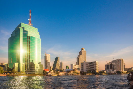 Bangkok Skyline as Seen from the Eastern Chao Phraya River Embankment at Sunset