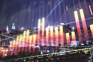 Double exposure of forex chart drawings over cityscape background. Concept of success.