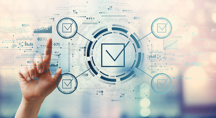 Checklist concept with hand pressing a button on a technology screen