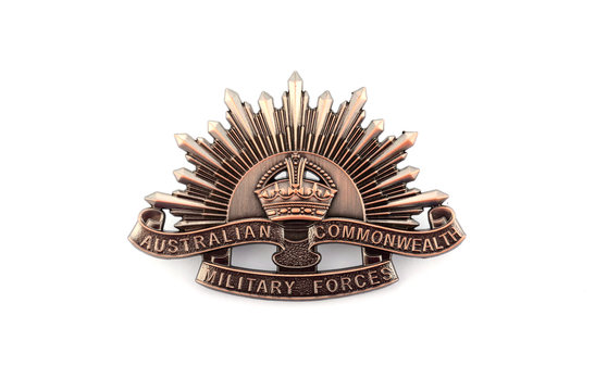 Australian Anzac WWI rising sun hat badge on white background. Adelaide, Australia - March 18, 2015:.