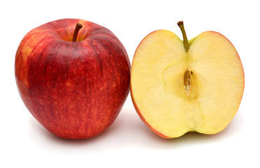 Red apple and half isolated on white background. Perfectly retouched, full depth of field on the photo. Creative idea fruit juice and drink. Top view, flat lay