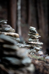 Rock balancing in the forest