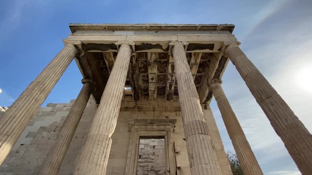 Parthenon antique temple with columns and blue sky on Acropolis of Athens Greece