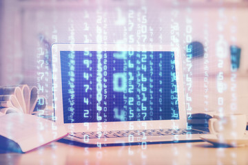 Double exposure of desktop computer and technology theme hologram. Concept of software development.