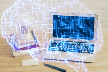 Multi exposure of work space with computer and human brain hologram. Brainstorm concept.