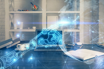 Computer on desktop in office with technology theme hologram. Multi exposure. Tech concept.