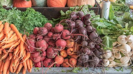 A fruit and vegetable stall at the South Melbourne Market with produce on display in the city of...