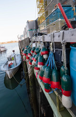 Fishing boats along Portland's piers at sunset - Portland, Maine.