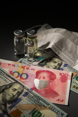 Chinese banknote wearing face mask with medicine and US banknote