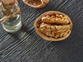 Walnuts lie on a light colored background