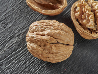 Walnuts lie on a light colored background