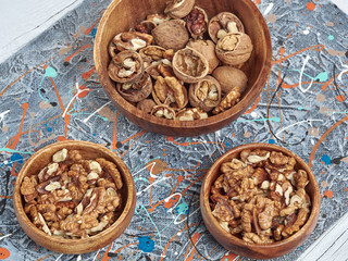 Walnuts lie on a light colored background