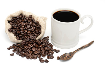 Coffee cup with coffee beans on a white background