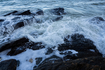 Waves coming to the rocky shore