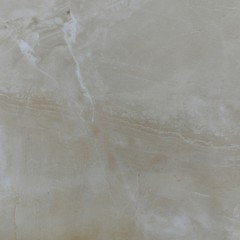 Naklejka premium Natural beige polished marble with a sloping line dividing the frame in half and two white zippers from the top corner.