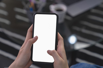 Hand holding blank screen of smartphone and for graphic display montage.