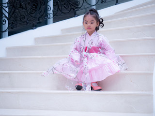 asian little girl Wearing yukata in house 