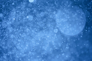 Blue glitter bokeh of light.Abstract blurred light