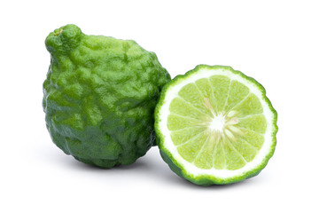 Bergamot or kaffir lime fruits and slice with seeds isolated on white background.