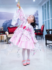 asian little girl Wearing yukata in house with balloon