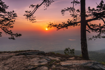 Beautiful sunrise  on the high mountain in Phu-kra-dueng national park Loei province, Thailand.