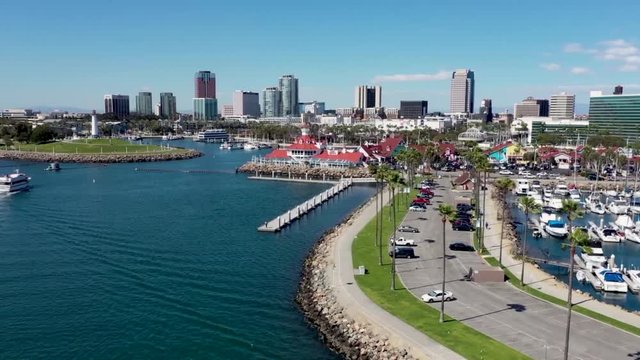 Port of Long Beach Harbor Aerial View Over Yacht, Lighthouse, and American Flag