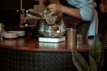 The barista prepare to make the drip coffee