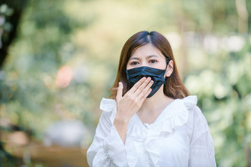 Business women wears a health mask