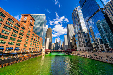 Chicago building and cityscape on Saint Patrick's day around Chicago river walk with green color...