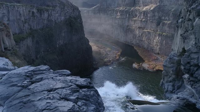 Aerial view of a beautiful Northwest waterfall in the fall. Filmed in 4K 60fps