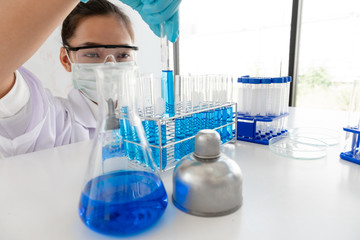 Medical scientists have experimented with liquid chemicals in vitro to analyze viral data in chemical laboratories. Scientific research concepts