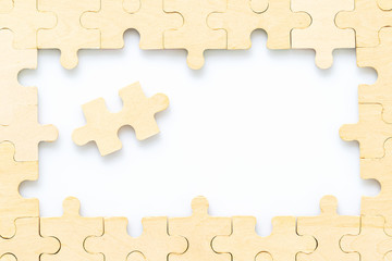 wooden jigsaw puzzle pieces on white background