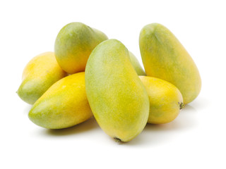 green mangoes on white background.