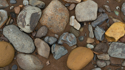 Rocks in the river after the flood. Images suitable for use as wallpaper or graphic material