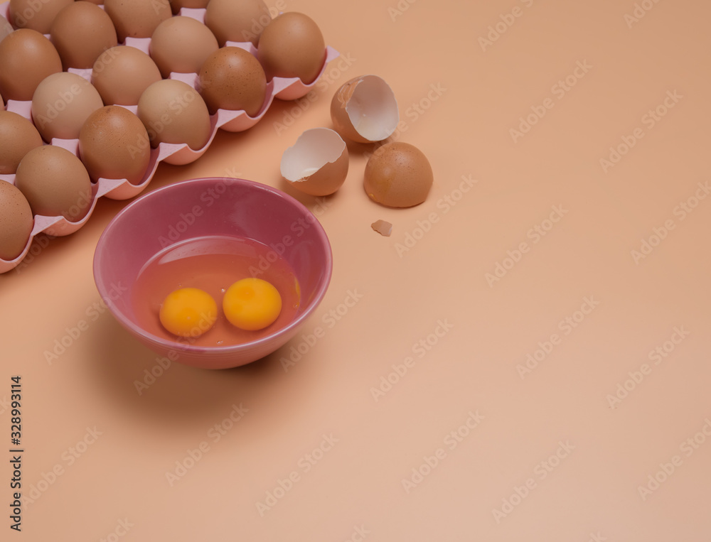 Sticker eggs in bowl with eggshell on table