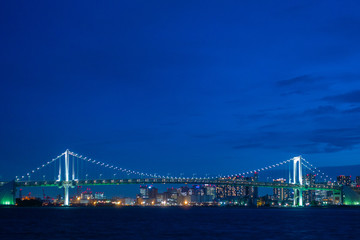 Fototapeta na wymiar Rainbow bridge eveing in Tokyo city.
