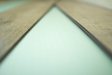 Vinyl laminate. Laying of the floor covering.