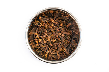 Cloves in Stainless Steel bowl isolated on a white background, aromatic cooking ingredient spice and condiment. Closeup detail, medicinal properties.