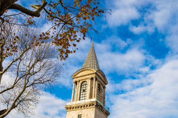 A tower in Topkapi Palace, Istanbul, Turkey. Photo was taken in a cloudy afternoon at autumn/fall.