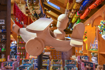 Naklejka premium Clogs for sale at a Dutch retail shop. Wooden shoes are a well know traditional souvenir from Netherlands