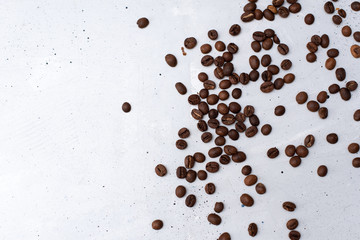 Cup of coffee on grey background, top view